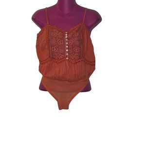 Free People Still the One orange lace bodysuit